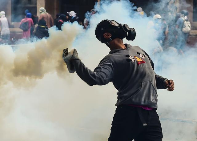 A 24-hour nationwide strike got underway in Venezuela Thursday, in a bid by the opposition to increase pressure on beleaguered leftist President Nicolas Maduro following four months of deadly street demonstrations. (AFP Photo) A 24-hour nationwide strike got underway in Venezuela Thursday, in a bid by the opposition to increase pressure on beleaguered leftist President Nicolas Maduro following four months of deadly street demonstrations. (AFP Photo)