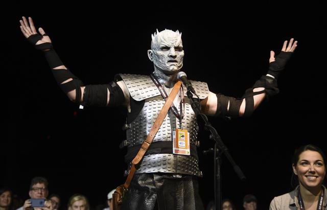 Fan Christopher Lomas, dressed as the Night King, asks a question at the Game of Thrones panel on day two of Comic-Con International. (Powers Imagery/Invision/AP) Fan Christopher Lomas, dressed as the Night King, asks a question at the Game of Thrones panel on day two of Comic-Con International. (Powers Imagery/Invision/AP)