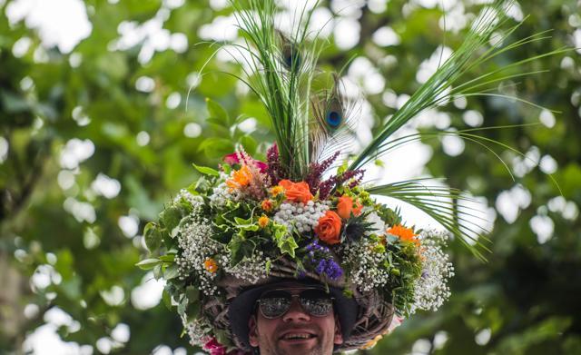 A participant wears an elaborate headpiece while standing on a float during Berlin's annual Christopher Street Day (CSD) gay pride parade on July 22.  (AFP Photo)