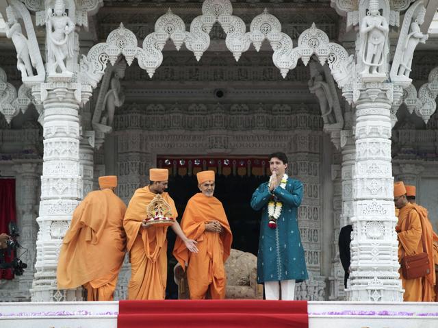 Canada's Prime Minister Justin Trudeau visits the BAPS Shri Swaminarayan Mandir to celebrate the 10th anniversary of the Hindu temple in Mississauga, Ontario on Saturday. (AP) Canada's Prime Minister Justin Trudeau visits the BAPS Shri Swaminarayan Mandir to celebrate the 10th anniversary of the Hindu temple in Mississauga, Ontario on Saturday. (AP)