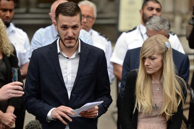 Chris Gard (left) the father of terminally ill 11-month-old Charlie Gard reads out a statement while Charlie's mother Connie Yates (right) looks on at the Royal Courts of Justice in London. (AFP Photo) Chris Gard (left) the father of terminally ill 11-month-old Charlie Gard reads out a statement while Charlie's mother Connie Yates (right) looks on at the Royal Courts of Justice in London. (AFP Photo)