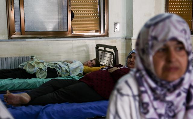 Syrian patients lie on beds in a room at the mental health clinic in the town of Azaz, near the border with Turkey, on July 6, 2017. (AFP) Syrian patients lie on beds in a room at the mental health clinic in the town of Azaz, near the border with Turkey, on July 6, 2017. (AFP)