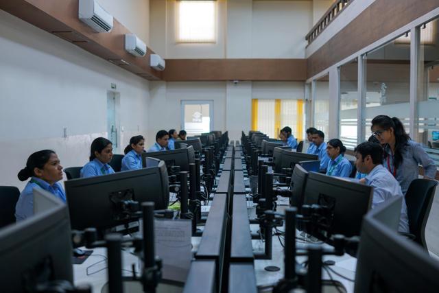 Female police officials work inside the police command centre at Jaipur Commissionate Headquarters. (AFP) Female police officials work inside the police command centre at Jaipur Commissionate Headquarters. (AFP)