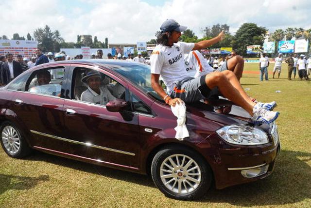 Indian cricket team batsman Virender Sehwag gives his teammates a ride in the car presented to him after receiving the Man of The Series trophy following the third Test match against Sri Lanka cricket team at The P. Sara Oval International Cricket Stadium in Colombo on August 7, 2010. (Getty Images) Indian cricket team batsman Virender Sehwag gives his teammates a ride in the car presented to him after receiving the Man of The Series trophy following the third Test match against Sri Lanka cricket team at The P. Sara Oval International Cricket Stadium in Colombo on August 7, 2010. (Getty Images)