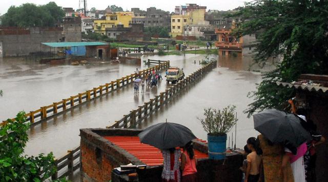 Water-logging at Bagbera locality in Jamshedpur (Manoj Kumar/ HT Photo) Water-logging at Bagbera locality in Jamshedpur (Manoj Kumar/ HT Photo)