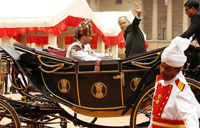Pranab Mukherjee waves as he arrives in a horse driven carriage at the Rashtrapati Bhawan, having been sworn in as the India’s 13th President on July 25, 2012 in New Delhi. (Ajay Aggarwal / HT Photo) Pranab Mukherjee waves as he arrives in a horse driven carriage at the Rashtrapati Bhawan, having been sworn in as the India’s 13th President on July 25, 2012 in New Delhi. (Ajay Aggarwal / HT Photo)