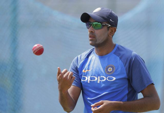 Ravichandran Ashwin tosses a ball during a training session ahead of the first Test against Sri Lanka. (AP)