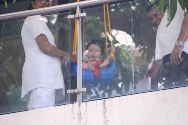 Actor Kareena Kapoor Khan and Saif Ali Khan’s son Taimur enjoying his time on his balcony swing. (Viral Bhayani)