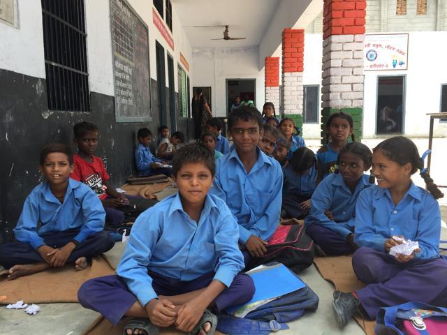 Students sitting on the floor in Government Primary School, Jeevan Nagar, Faridkot. (HT Photo)