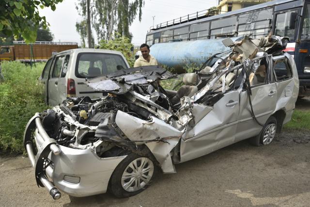 The mangled remains of the Innova car in which the family was travelling. (Sushil Kumar/HT PHOTO) The mangled remains of the Innova car in which the family was travelling. (Sushil Kumar/HT PHOTO)