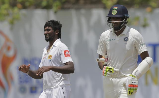 Sri Lanka's Nuwan Pradeep celebrates the dismissal of India's Ravichandran Ashwin in Galle on Thursday. (AP) Sri Lanka's Nuwan Pradeep celebrates the dismissal of India's Ravichandran Ashwin in Galle on Thursday. (AP)