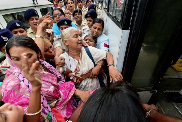 Narmada Bachao Andolan (NBA) leader Medha Patkar with oustees of Sardar Sarovar Dam being arrested after they stage a demonstration at Madhya Pradesh Assembly for their demands including rehabilitation and compensation in Bhopal. (PTI) Narmada Bachao Andolan (NBA) leader Medha Patkar with oustees of Sardar Sarovar Dam being arrested after they stage a demonstration at Madhya Pradesh Assembly for their demands including rehabilitation and compensation in Bhopal. (PTI)