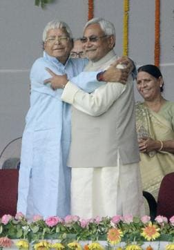 Lalu Yadav hugs Nitish Kumar during the oath taking ceremony on November 20, 2015. (Arun Abhi/Hindustan Times)) Lalu Yadav hugs Nitish Kumar during the oath taking ceremony on November 20, 2015. (Arun Abhi/Hindustan Times))