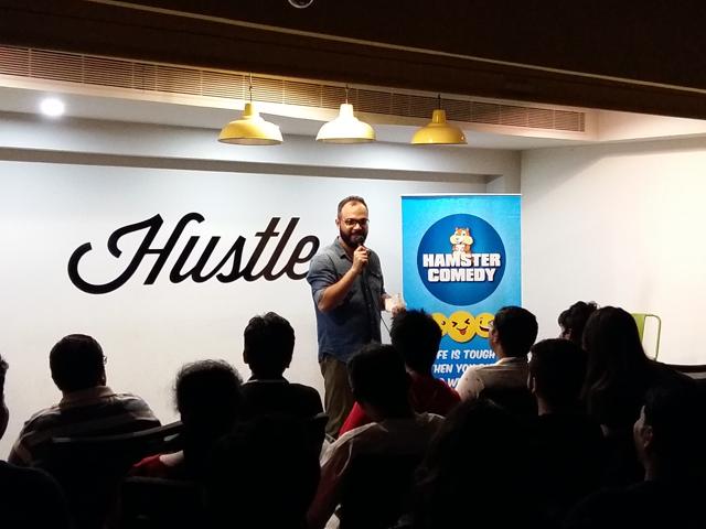 Ankit Bareja, one of the co-founders of Hamster Comedy hosting an open-mic event. Ankit Bareja, one of the co-founders of Hamster Comedy hosting an open-mic event.