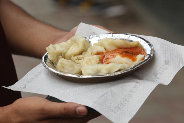 A shot of the popular Chicken momos that are served at the Dolma aunty momo stall in Kamla Nagar market. (Manoj Verma/HT Photo)