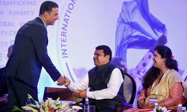 Maharashtra Chief Minister Devendra Fadnavis Maharashtra minister for Women and Child Development Pankaja Munde and actor Akshay Kumar during an international conference on women trafficking in Mumbai on Thursday. (PTI) Maharashtra Chief Minister Devendra Fadnavis Maharashtra minister for Women and Child Development Pankaja Munde and actor Akshay Kumar during an international conference on women trafficking in Mumbai on Thursday. (PTI)