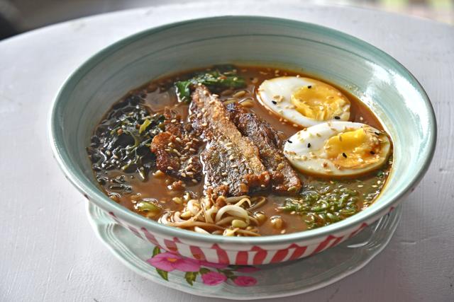 Even the many slices of pork and halved soft-boiled eggs could not rescue the insipid chashu ramen miso. (Shashi Kashyap / HT Photo)