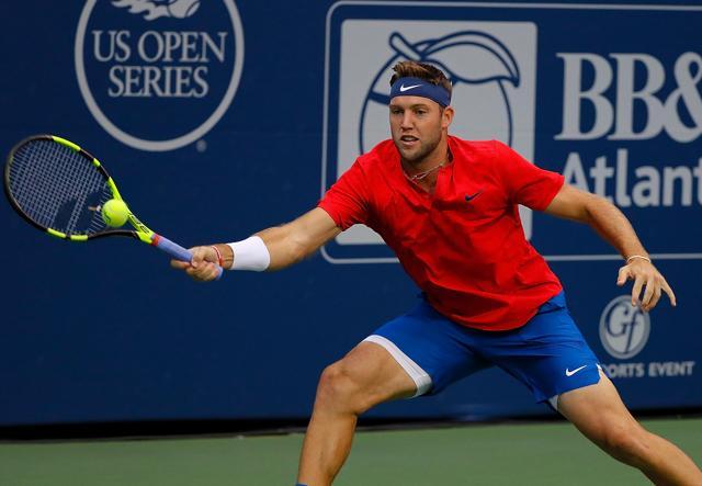 ATLANTA, GA - JULY 28: Jack Sock returns a forehand to Kyle Edmund of Great Britain. (AFP) ATLANTA, GA - JULY 28: Jack Sock returns a forehand to Kyle Edmund of Great Britain. (AFP)