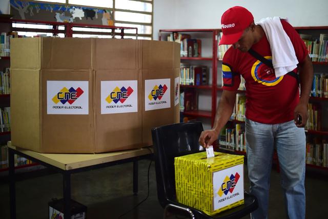 A man casts his vote to elect a Constituent Assembly in Caracas on July 30, 2017. (AFP)