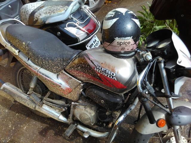 One of the two wheelers that got damaged in the tree collapse. (Praful Gangurde/HT Photo)