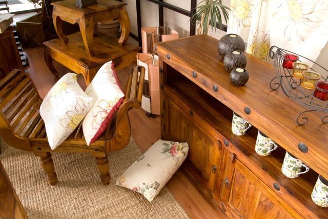 Move your wooden furniture away from doors and windows, where it can’t come in contact with raindrops or leakages. (Shutterstock)
