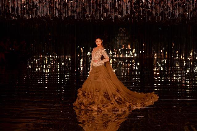 Alia Bhat presents a creation by Malhotra. (AFP)