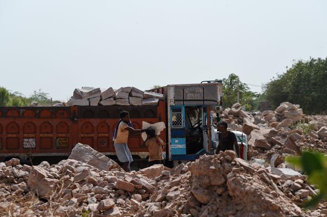 Pakistani migrants work in a stone quarry in Jodhpur. (AFP Photo) Pakistani migrants work in a stone quarry in Jodhpur. (AFP Photo)