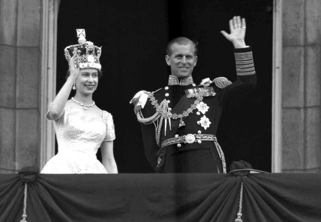 Britain's Queen Elizabeth II and Prince Philip, Duke of Edinburgh wave to supporters from Buckingham Palace following her coronation at Westminster Abbey. London on June. 2, 1953. (AP) Britain's Queen Elizabeth II and Prince Philip, Duke of Edinburgh wave to supporters from Buckingham Palace following her coronation at Westminster Abbey. London on June. 2, 1953. (AP)
