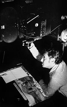 RL Mistry, the animator of the DD symbol, working with the Oxberry camera. Mistry is also a former NID student. (Photo courtesy: 50 years of National Institute of Design (1961-2011)) RL Mistry, the animator of the DD symbol, working with the Oxberry camera. Mistry is also a former NID student. (Photo courtesy: 50 years of National Institute of Design (1961-2011))