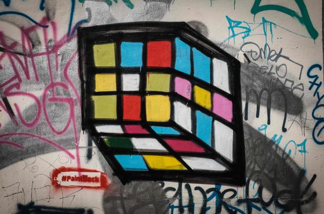 Picture taken on May 11, 2016 shows a graffiti created from a swastika symbol by artist Ibo Omari resembling a Rubik's Cube in Berlin. (AFP) Picture taken on May 11, 2016 shows a graffiti created from a swastika symbol by artist Ibo Omari resembling a Rubik's Cube in Berlin. (AFP)