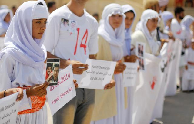 Yazidis attend a commemoration of the third anniversary of the Yazidi genocide in Sinjar region, Iraq August 3, 2017. (Reuters Photo) Yazidis attend a commemoration of the third anniversary of the Yazidi genocide in Sinjar region, Iraq August 3, 2017. (Reuters Photo)