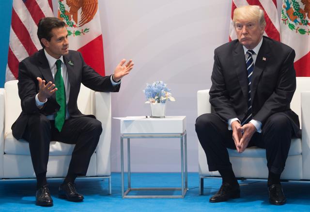 Donald Trump and Mexican President Enrique Pena Nieto holding a meeting on the sidelines of the G20 Summit in Hamburg on July 7, 2017. (AFP) Donald Trump and Mexican President Enrique Pena Nieto holding a meeting on the sidelines of the G20 Summit in Hamburg on July 7, 2017. (AFP)