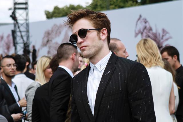 British actor Robert Pattinson arrives before Christian Dior 2017 fall/winter Haute Couture collection show in Paris on July 3. (AFP)