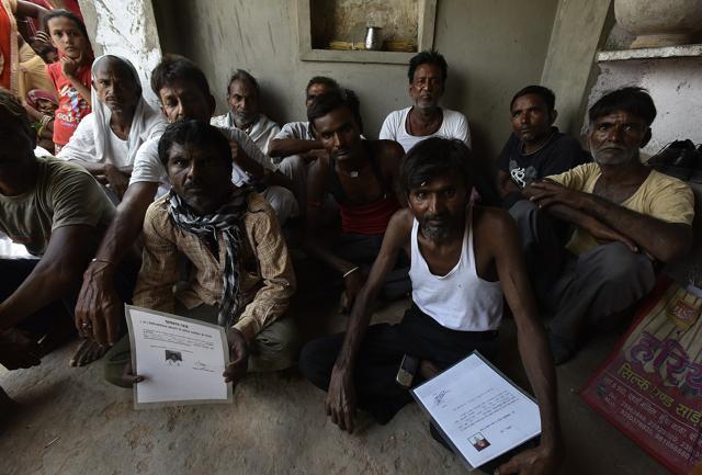 Mine workers with their silicosis certificates in Rajasthan’s Nagaur district. The process to claim compensation across the state has become very cumbersome. (Raj K Raj/HT PHOTO) Mine workers with their silicosis certificates in Rajasthan’s Nagaur district. The process to claim compensation across the state has become very cumbersome. (Raj K Raj/HT PHOTO)