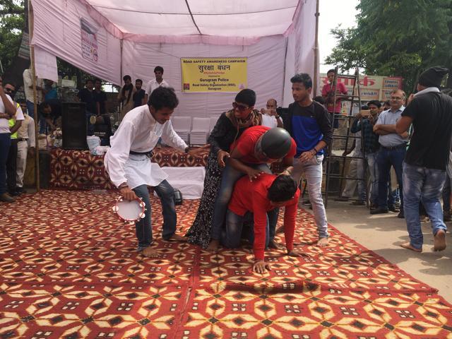 Nukkad natak on triple riding in progress. (Naina Arora/HT Photo)
