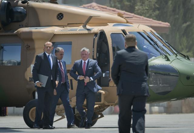 Jordan's King Abdullah arrives for a meeting with Palestinian President Mahmoud Abbas, at the Palestinian headquarters in the West Bank city of Ramallah, on August 7, 2017. (AP)