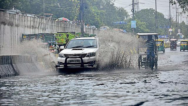 Waterlogging after heavy rainfall near Vinod Nagar, East Delhi, on Monday. (Arun Sharma/HT PHOTO)