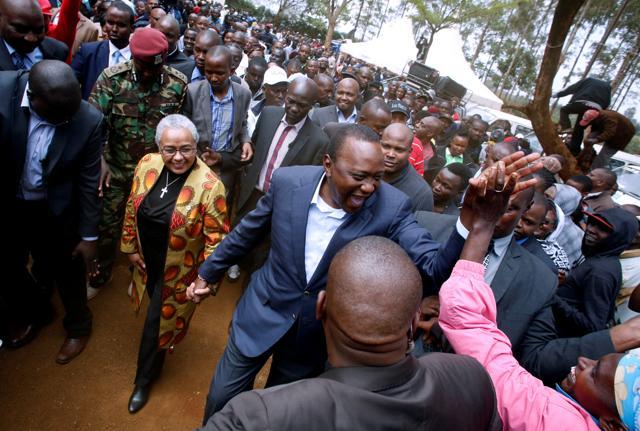 Kenya's President Uhuru Kenyatta is greeted by supporters after casting his vote in the Kenya election in his hometown of Gatundu in Kiambu county, Kenya August 8, 2017. (REUTERS) Kenya's President Uhuru Kenyatta is greeted by supporters after casting his vote in the Kenya election in his hometown of Gatundu in Kiambu county, Kenya August 8, 2017. (REUTERS)