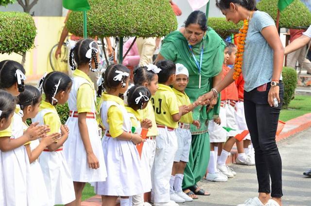 Harmanpreet Kaur paid a visit to the Gian Jyoti Public School in Moga, Punjab, after coming back from England. She learnt the early lessons of cricket under coach Yadwinder Singh Sodhi in this school. Harmanpreet Kaur paid a visit to the Gian Jyoti Public School in Moga, Punjab, after coming back from England. She learnt the early lessons of cricket under coach Yadwinder Singh Sodhi in this school.