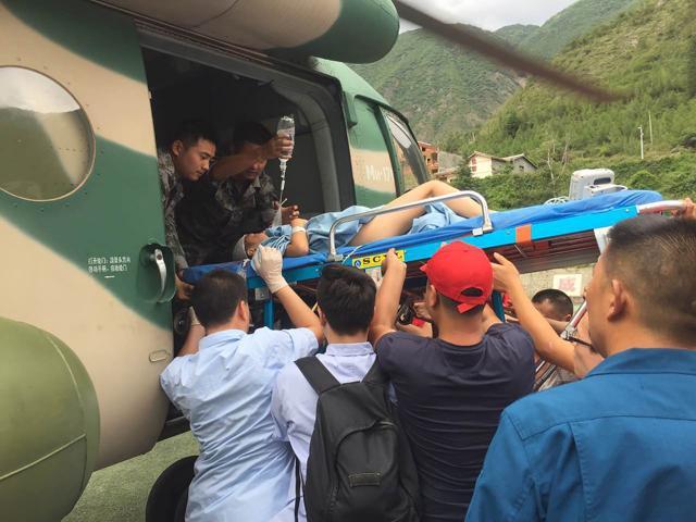 Rescuers transfer a survivor injured during an earthquake by a helicopter to Sichuan Provincial People's Hospital in Jiuzhaigou in China's southwestern Sichuan province on August 9, 2017. (AFP) Rescuers transfer a survivor injured during an earthquake by a helicopter to Sichuan Provincial People's Hospital in Jiuzhaigou in China's southwestern Sichuan province on August 9, 2017. (AFP)