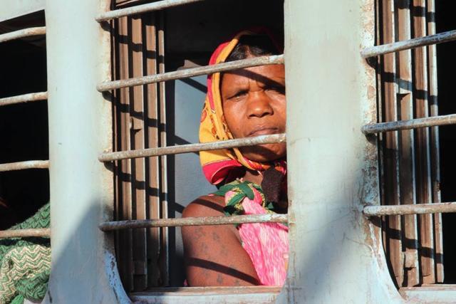 A tribal woman peers out the Visakhapatnam-Kirandul Express, the only one running through Dantewada. (Ritesh Mishra / HT Photo) A tribal woman peers out the Visakhapatnam-Kirandul Express, the only one running through Dantewada. (Ritesh Mishra / HT Photo)