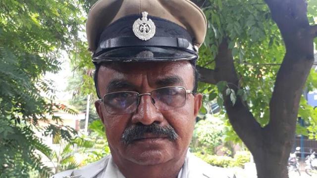 The Bengaluru traffic police sub-inspector M L Nijalingappa who was rewarded for allowing an ambulance carrying a critical patient to pass before the President’s convoy. (Twitter) The Bengaluru traffic police sub-inspector M L Nijalingappa who was rewarded for allowing an ambulance carrying a critical patient to pass before the President’s convoy. (Twitter)