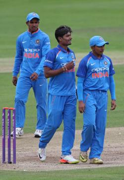 Anukul Roy (C) of India U-19 celebrates with teammates after taking the wicket of Harry Brook of England U-19 in Canterbury, England on Wednesday. (Getty Images) Anukul Roy (C) of India U-19 celebrates with teammates after taking the wicket of Harry Brook of England U-19 in Canterbury, England on Wednesday. (Getty Images)
