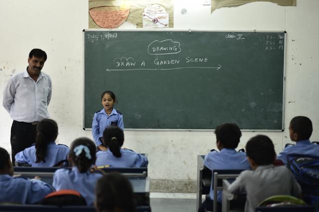 Vice-principal Sukhbir Singh Yadav said the school building gives the “look and feel” of a private school, which attracts parents and students. (Burhaan Kinu/HT PHOTO) Vice-principal Sukhbir Singh Yadav said the school building gives the “look and feel” of a private school, which attracts parents and students. (Burhaan Kinu/HT PHOTO)
