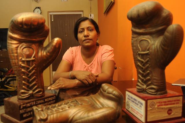 Women boxing coach and referee Razia Shabnam at her Ekbalpore residence in Kolkata. (Samir Jana/HT Photo) Women boxing coach and referee Razia Shabnam at her Ekbalpore residence in Kolkata. (Samir Jana/HT Photo)