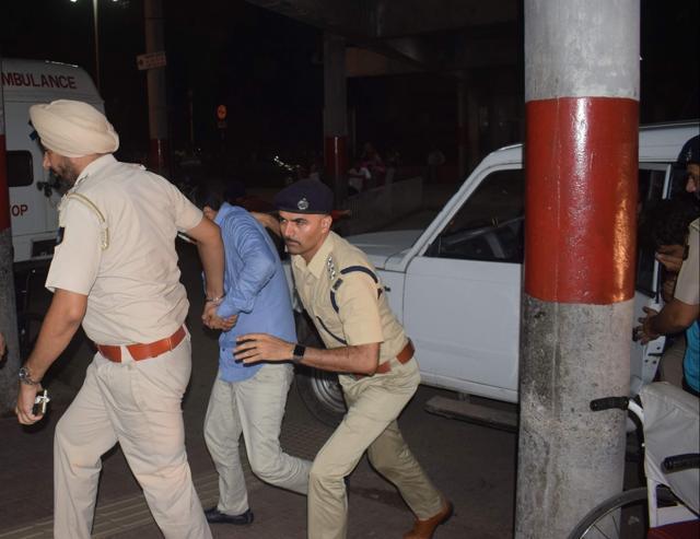 Police left the Sector 26 police station, where the accused are lodged, at 10:55 pm. (Karun Sharma/HT)
