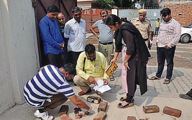 A forensic team collecting samples, in Panchkula on Friday. (HT Photo) A forensic team collecting samples, in Panchkula on Friday. (HT Photo)