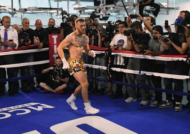 UFC lightweight champion Conor McGregor works on his footwork during a media workout at the UFC Performance Institute on Friday in Las Vegas, Nevada. McGregor will fight Floyd Mayweather Jr. in a boxing match at T-Mobile Arena on August 26 in Las Vegas. (AFP) UFC lightweight champion Conor McGregor works on his footwork during a media workout at the UFC Performance Institute on Friday in Las Vegas, Nevada. McGregor will fight Floyd Mayweather Jr. in a boxing match at T-Mobile Arena on August 26 in Las Vegas. (AFP)