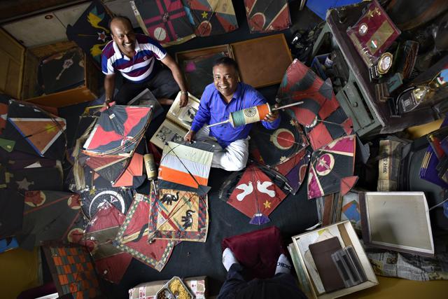 The house of kite flyers Sunil Gupta ( extreme right) and Manish Gupta is like a little museum of kites. (Raj K Raj/HT PHOTO) The house of kite flyers Sunil Gupta ( extreme right) and Manish Gupta is like a little museum of kites. (Raj K Raj/HT PHOTO)