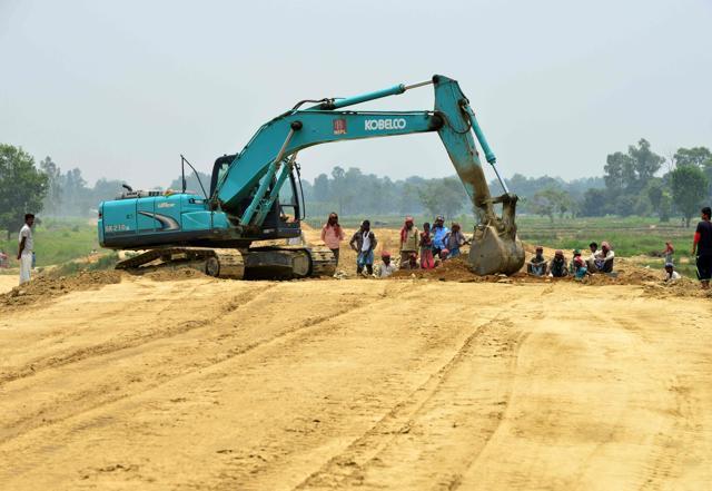 Indian labourers work on the construction area of new railway in Janakpur, some 300km south of Kathmandu. (AFP Photo) Indian labourers work on the construction area of new railway in Janakpur, some 300km south of Kathmandu. (AFP Photo)
